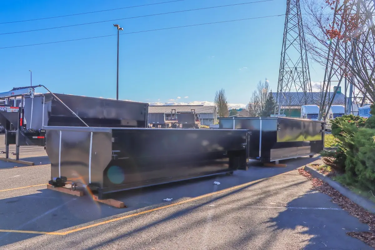 Roll-off dumpster ready for waste disposal at job site for Yard Waste Dumpster Rental in Lake Shore